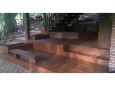 Attractive tiered wooden deck with seating